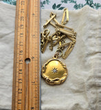 Antique Art Nouveau Repoussé 10K Gold Starburst Old Mine Diamond Locket