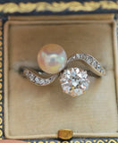 Antique Edwardian Platinum 1.22 Ct Old Cut Diamond Pearl Two Stone Toi et Moi Bypass Engagement Ring, Size 6-6.25